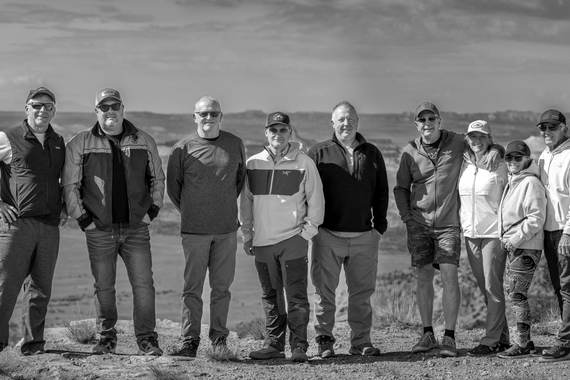 The group together on a mesa